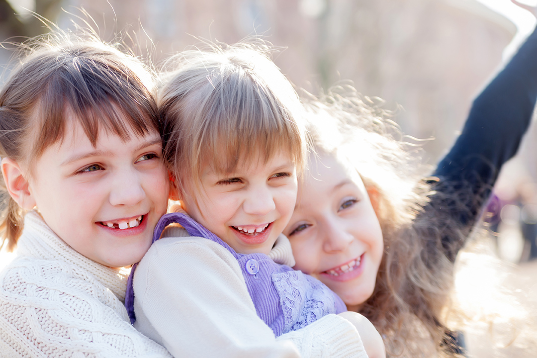 three young girls laughing in alpharetta georgia